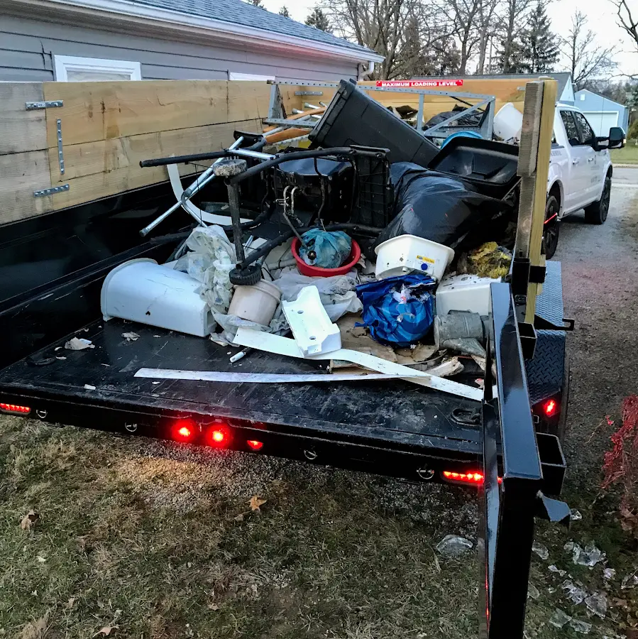 Roll-off dumpster delivered to a residential driveway in Karns